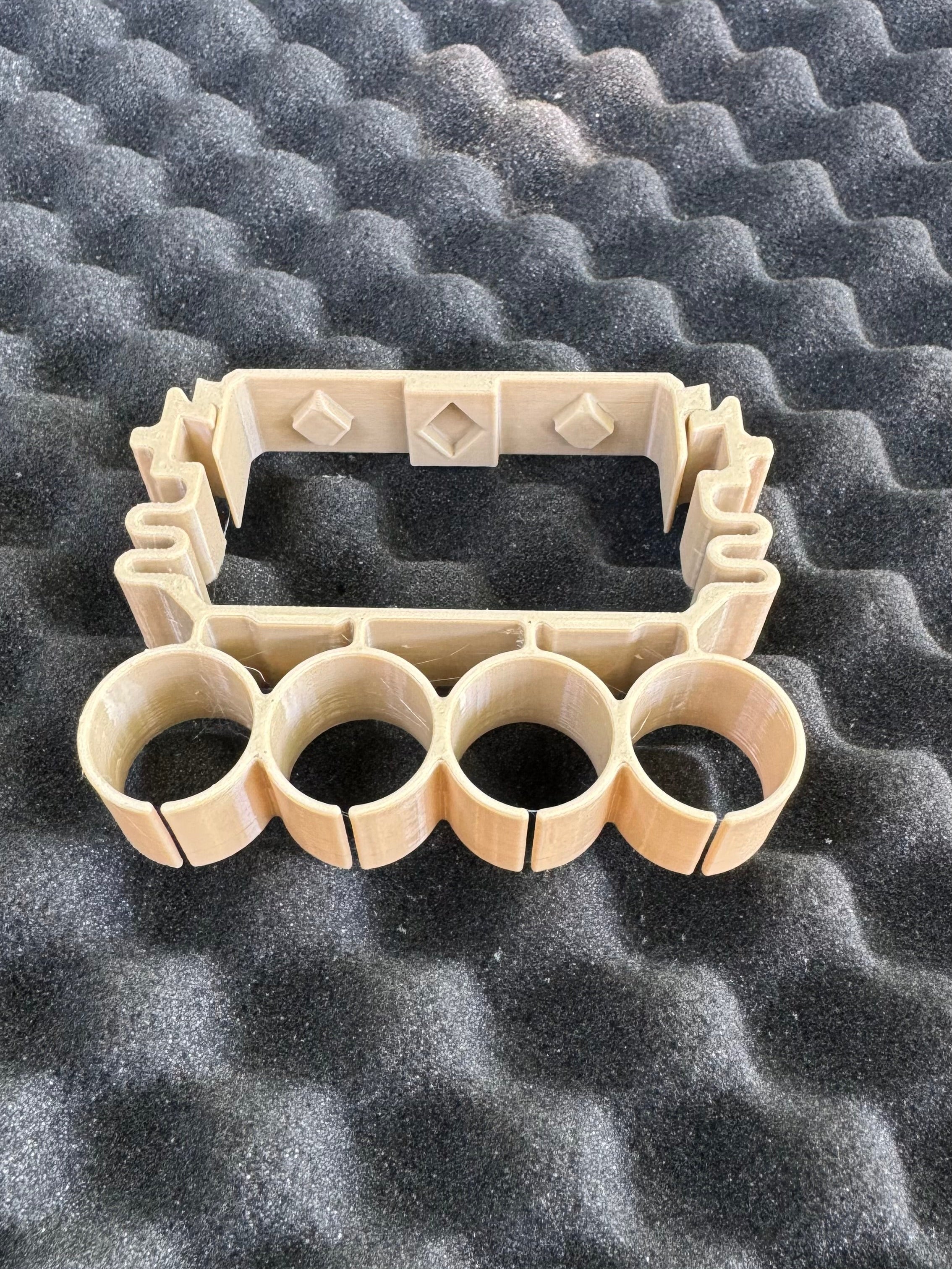 Quad holder for shotshell carriers (Cal 12)