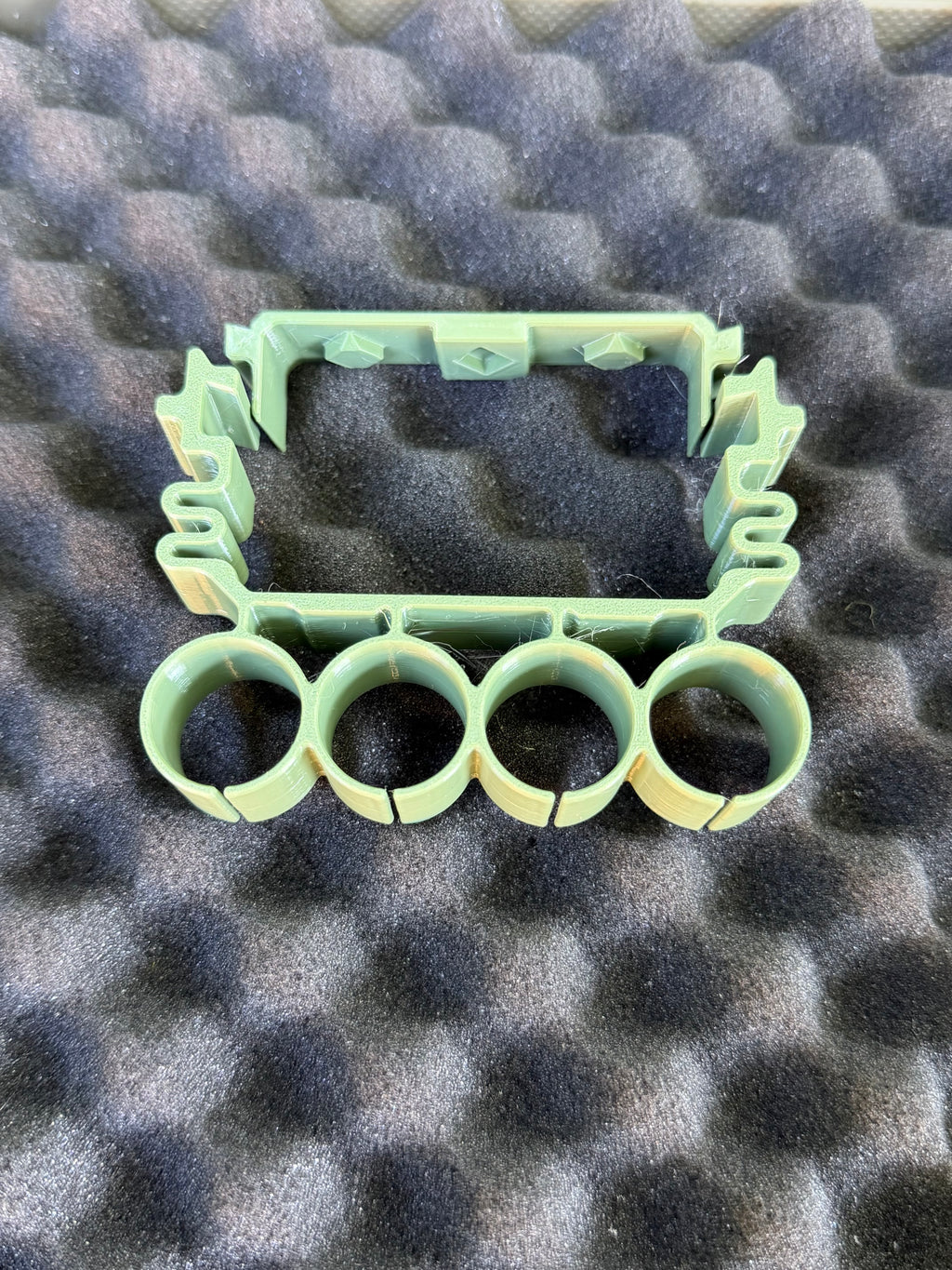 Quad holder for shotshell carriers (Cal 12)