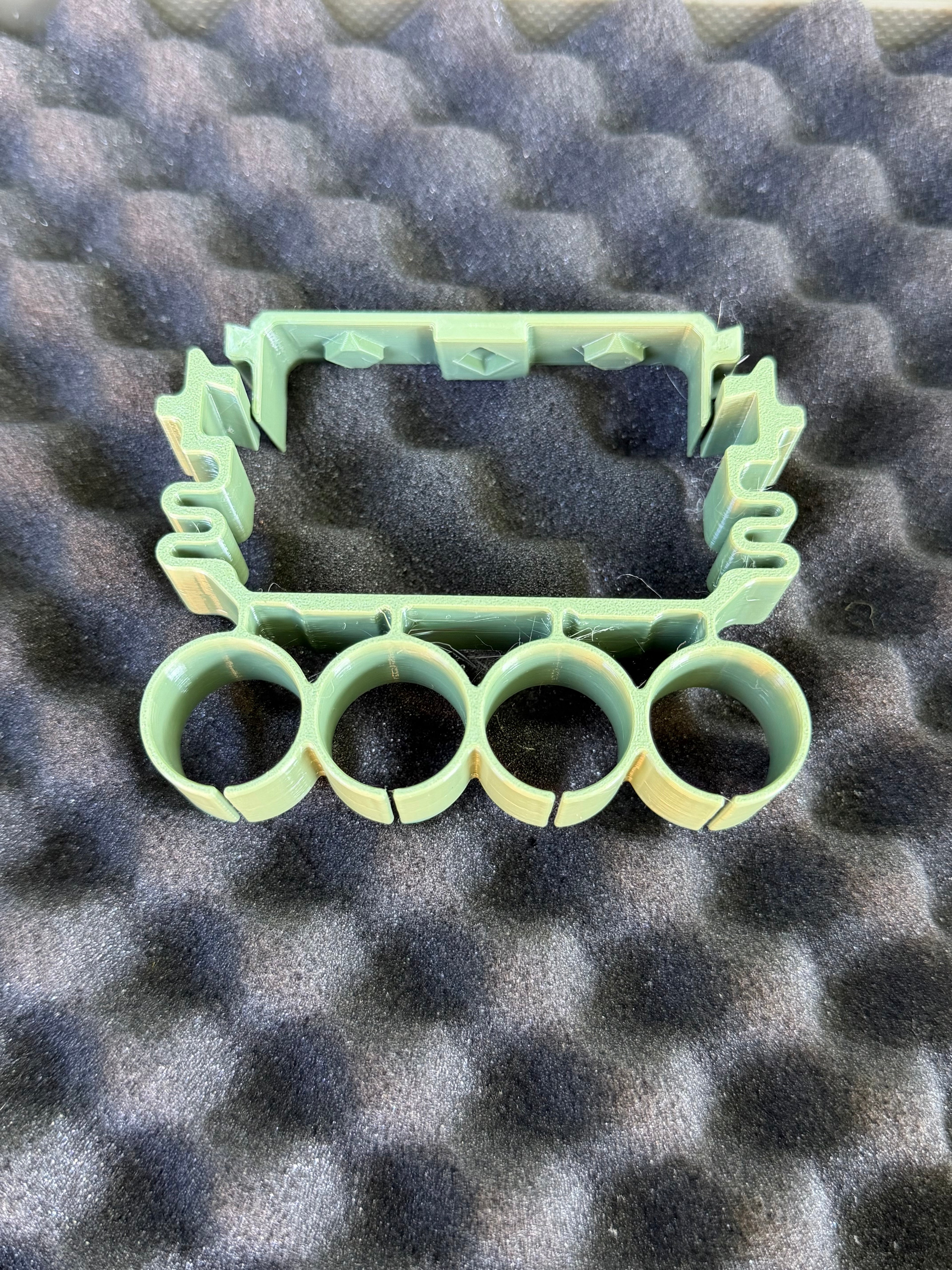 Quad holder for shotshell carriers (Cal 12)